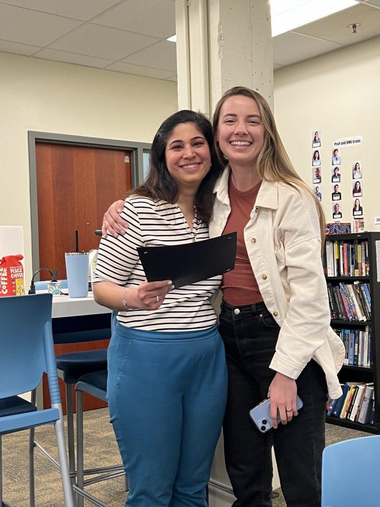 Corissa Rohloff receiving award from Nidhi Kohli