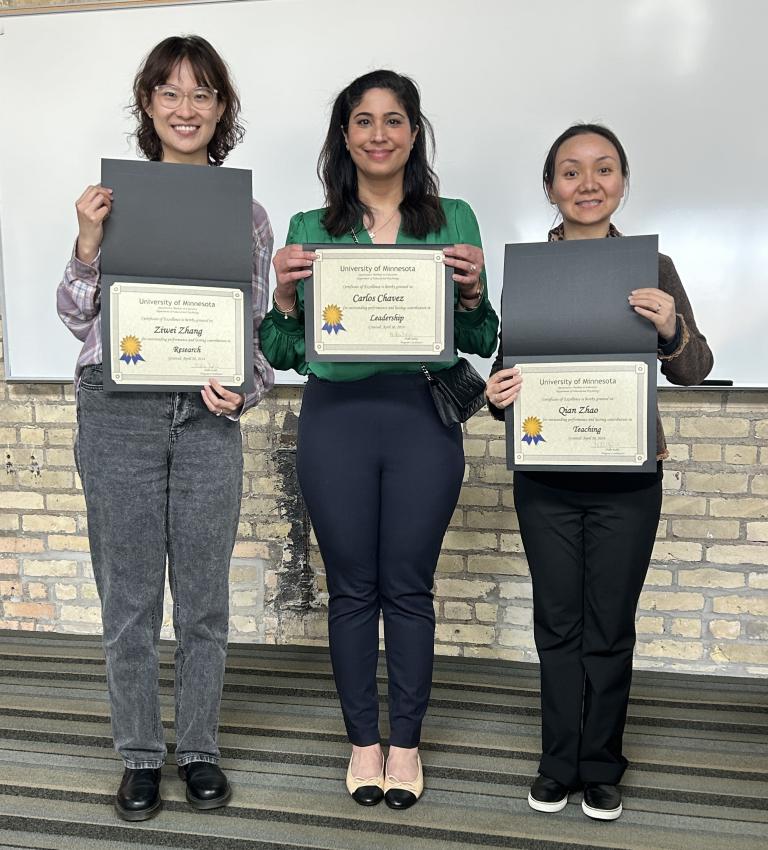 (L to R) Ziwei Zhang with the Research Award, Nodhi Kohli holding the Leadership Award for Carlos Chavez, Qian Zhao with the Teaching Award