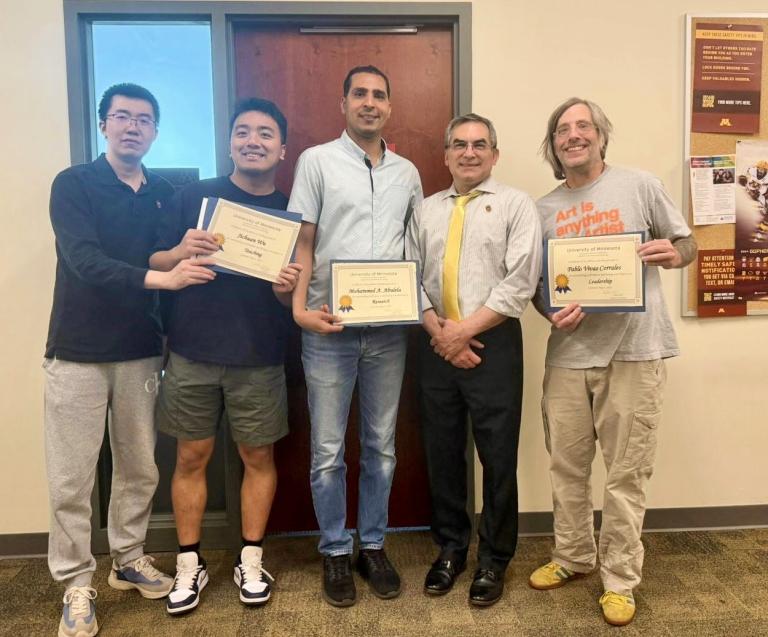 (Left to right), QME faculty member Haoran Li with his advisee Jichuan Wu (recipient of the Student Teaching Award), standing next to Mohammed A. A. Abulela (recipient of the Student Research Award), Michael Rodriguez (Mohammed’s advisor), and Andy Zieffler